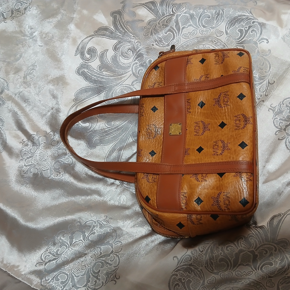 MCM Authentic Brown Leather Hand Bag with MCM Logo Pattern